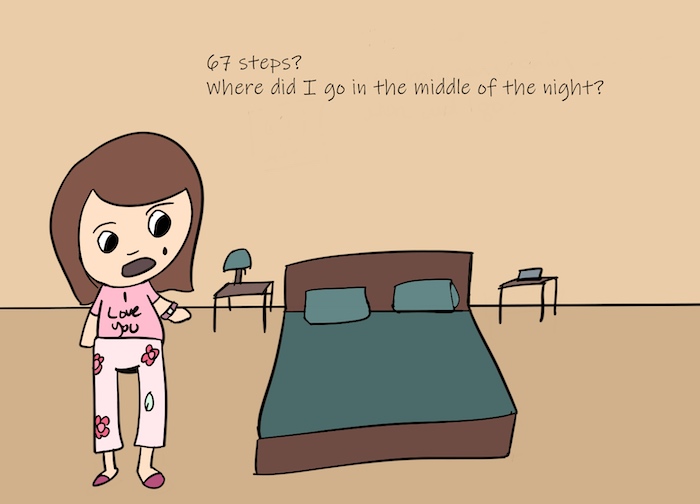 Magenta stands beside her bed in her pajamas and checks her Fitbit tracker. She says, "67 steps? Where did I go in the middle of the night?"